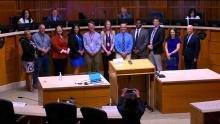 Group of people in the Aurora City Council Chamber that links to the meeting of May 20 2024