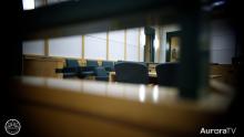 empty jury bench in Aurora court room